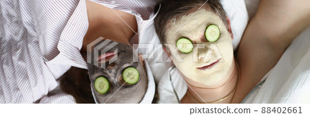 Guy and girl laying on bed Guy and girl laying on bed 88402661