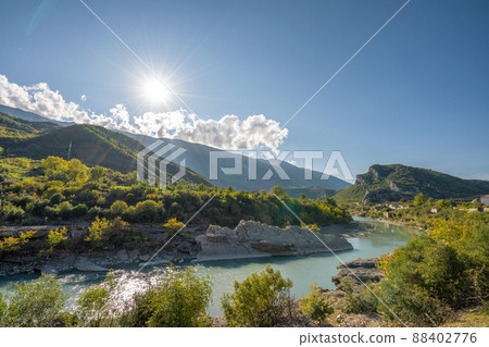 Beautiful mountain valley with gentle hills and agricultutal filds 88402776