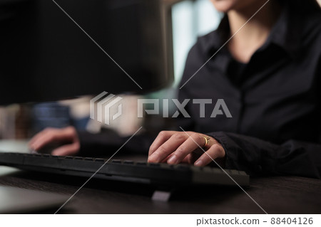 Neural network programmer developing artificial intelligence data processor. Security application engineer encrypting vital company information on blockchain system. Close up. 88404126