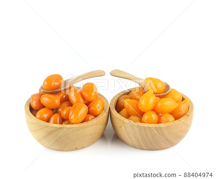 Two kinds of Thai ancient dessert - Egg yolk fudge balls cooked in syrup and  gold egg yolks dropi isolated on white background 88404974