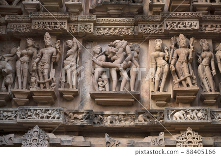 LAKSHMANA TEMPLE, Erotic sculpture at wall. Western Group, Khajuraho, Madhya Pradesh, India LAKSHMANA TEMPLE, Erotic sculpture at wall. Western Group, Khajuraho, Madhya Pradesh, India 88405166