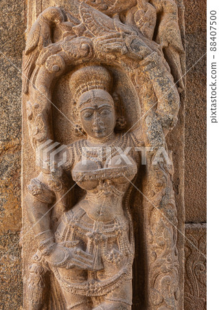 Carved scuplture of woman on entrance gate of Someshwara Temple, Kolar, Karnataka, India Carved scuplture of woman on entrance gate of Someshwara Temple, Kolar, Karnataka, India 88407500
