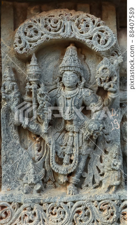 Sculpture of Lord Vishnu as Trivikrama in Vaman Avatar, Lakshminarsimha Temple, Javagal , Hassan, Karnataka, India 88407589