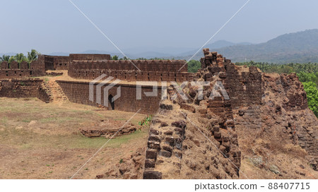 Fallen ruined Protection Wall of Fort, Mirjan Fort, Uttara Kannada, Karnataka, India Fallen ruined Protection Wall of Fort, Mirjan Fort, Uttara Kannada, Karnataka, India 88407715