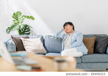 Senior woman tired napping Senior woman tired napping 88409323