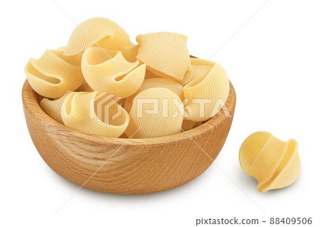 lumaconi pasta in wooden bowl isolated on white background with clipping path and full depth of field lumaconi pasta in wooden bowl isolated on white background with clipping path and full depth of field 88409506