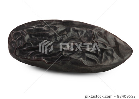 Tonka bean isolated on white background with clipping path and full depth of field. Bean of Dipteryx odorata 88409552