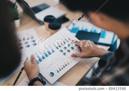 businessman working data document graph chart report marketing research development planning management strategy analysis financial accounting. close up. businessman working data document graph chart report marketing research development planning management strategy analysis financial accounting. close up. 88413590