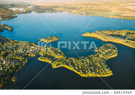 Lyepyel, Lepel Lake, Beloozerny District, Vitebsk Region. Aerial View Of Lyepyel Cityscape Skyline In Autumn Morning. Morning Fog Above Lepel Lake. Top View Of European Nature From High Attitude In Lyepyel, Lepel Lake, Beloozerny District, Vitebsk Region. Aerial View Of Lyepyel Cityscape Skyline In Autumn Morning. Morning Fog Above Lepel Lake. Top View Of European Nature From High Attitude In 88414564