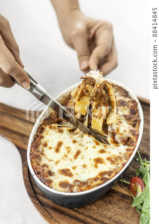 fresh beef lasagna in oven dish on table in rome italy restaurant 88414845