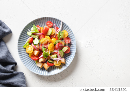 Tuscan Panzanella with tomatoes and bread. Top view. 88415891