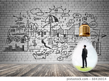 Businessman trapped in bulb 88416014