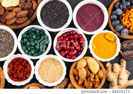 Various superfoods and healthy food supplement. 88416373