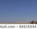 Romancecar EXE crossing the Tama River in the morning 88416944