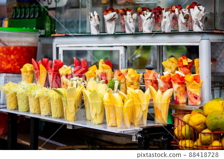 Street sell of mango and other fruits at the beautiful streets of Salento an small town located at the Quindio region in Colombia 88418728