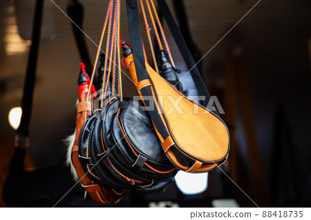 Traditional handcrafted wineskin boots in Salento an small town of the region of Quindio in Colombia 88418735