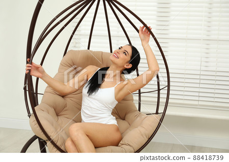 Beautiful young woman in white underwear at home 88418739