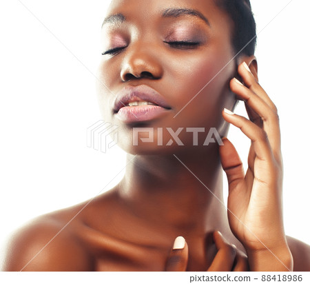 young pretty african american woman naked taking care of her skin isolated on white background, healthcare people concept young pretty african american woman naked taking care of her skin isolated on white background, healthcare people concept 88418986