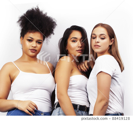 different nation woman: african-american, caucasian, asian together isolated on white background happy smiling, diverse type on skin, lifestyle people concept different nation woman: african-american, caucasian, asian together isolated on white background happy smiling, diverse type on skin, lifestyle people concept 88419128