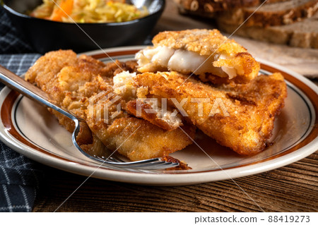 Fried cod fillet. 88419273