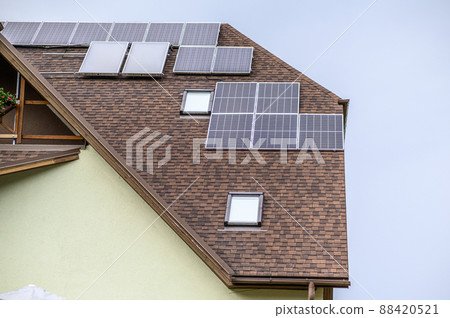 Solar panels on the roof of a private house. Ecological sources of energy. Solar panels on the roof of a private house. Ecological sources of energy. 88420521
