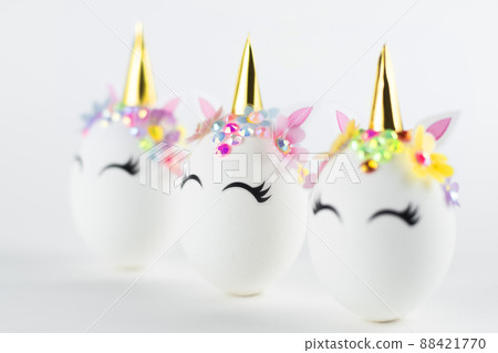 Easter unicorn eggs isolated on white background. Happy easter banner. Kids activity inspiration. Greeting card or poster. Copy space for text Easter unicorn eggs isolated on white background. Happy easter banner. Kids activity inspiration. Greeting card or poster. Copy space for text 88421770