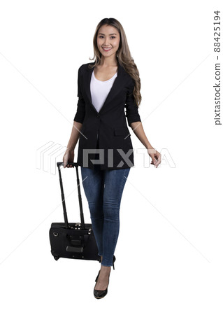 Businesswoman walking forward and pulling baggage on white background Businesswoman walking forward and pulling baggage on white background 88425194