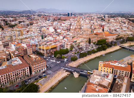 Aerial view of Murcia cityscape with a segura river and apartment buildings Aerial view of Murcia cityscape with a segura river and apartment buildings 88427457