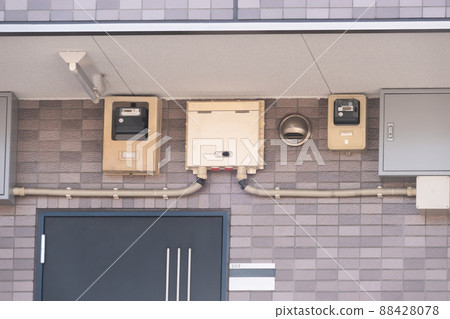 Apartment house, equipment around the entrance, electricity meter, electric box 88428078