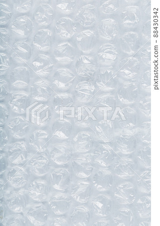 The texture of the packaging air-bubble film on a White background in full screen 88430342