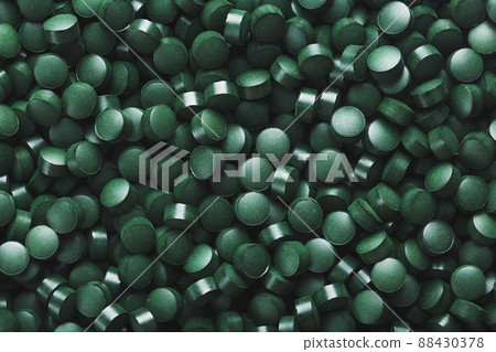 Green tablets from spirulina vegetarian dietary supplement Green tablets from spirulina vegetarian dietary supplement 88430378