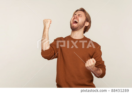 Portrait of emotional bearded man on gray background. Portrait of emotional bearded man on gray background. 88431289