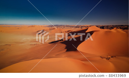 Sunset view to Tin Merzouga dune at Tassili nAjjer national park in Algeria Sunset view to Tin Merzouga dune at Tassili nAjjer national park in Algeria 88433969