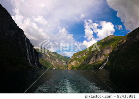Aerial panorama view to Geiranger fjord,Mollsbygda and The Seven Sisters and Geitfossen waterfalls, Norway 88433981