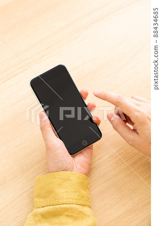 Middle woman with smartphone Middle woman with smartphone 88434685