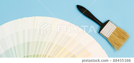 A painter is choosing a paint shade for the interior of the house's walls. with interior 88435166