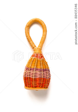 Traditional colorful braided caxixi isolated on white Traditional colorful braided caxixi isolated on white 88435346