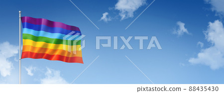 Rainbow peace flag isolated on a blue sky. Horizontal banner 88435430