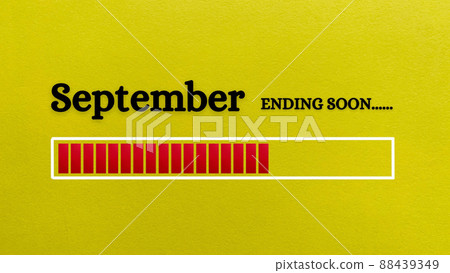 Top view of loading bar showing the end of September month with yellow paper background. Month concept 88439349