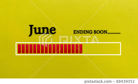 Top view of loading bar showing the end of June month with yellow paper background. Month concept 88439352