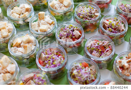 Salad Variationen in glass. Vegetable salad in glass jar. Salad Variationen in glass. Vegetable salad in glass jar. 88440244