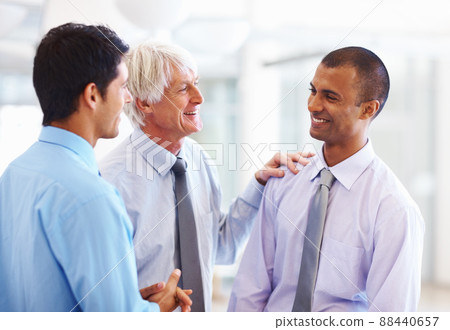 Business men having happy discussion. Portrait of business men having happy time while discussing with each other. Business men having happy discussion. Portrait of business men having happy time while discussing with each other. 88440657