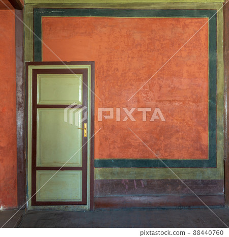 Colorful painted wall and green wooden door, Cairo, Egypt Colorful painted wall and green wooden door, Cairo, Egypt 88440760