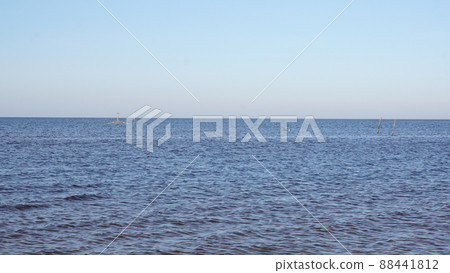 View of the White Sea in Russia and fishermen's nets set close to the shore. 88441812