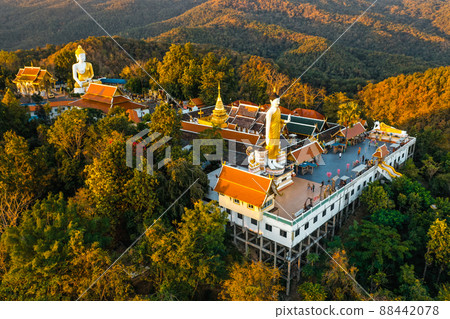 Aerial view of Wat Phrathat Doi Kham, Buddha pagoda and golden chedi in Chiang Mai, Thailand 88442078