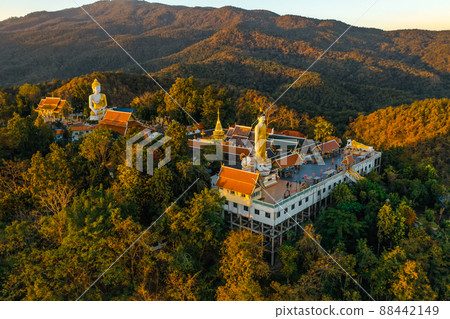 Aerial view of Wat Phrathat Doi Kham, Buddha pagoda and golden chedi in Chiang Mai, Thailand 88442149