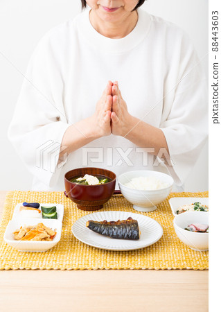 Middle woman eating Japanese food Middle woman eating Japanese food 88443603