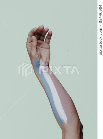 transgender pride flag in a persons arm 88446984
