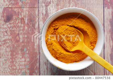 top view of turmeric root powder in bowl on table , top view of turmeric root powder in bowl on table , 88447538