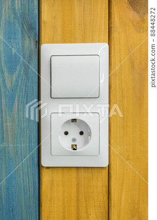 Power outlet connect plug voltage switch supply energy socket equipment electric appliance on colorful yellow wooden background 88448272